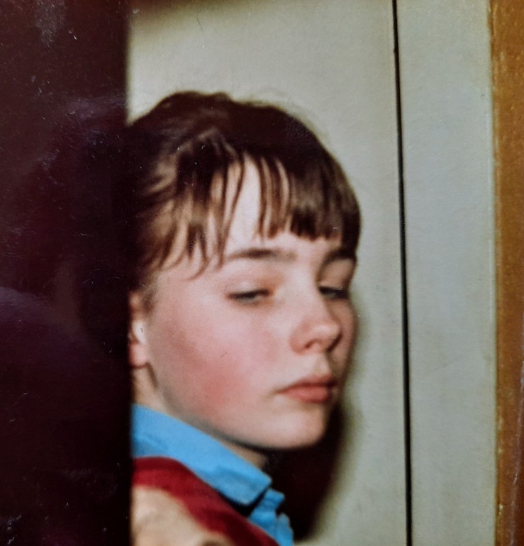 A photography of Emma, age 13.